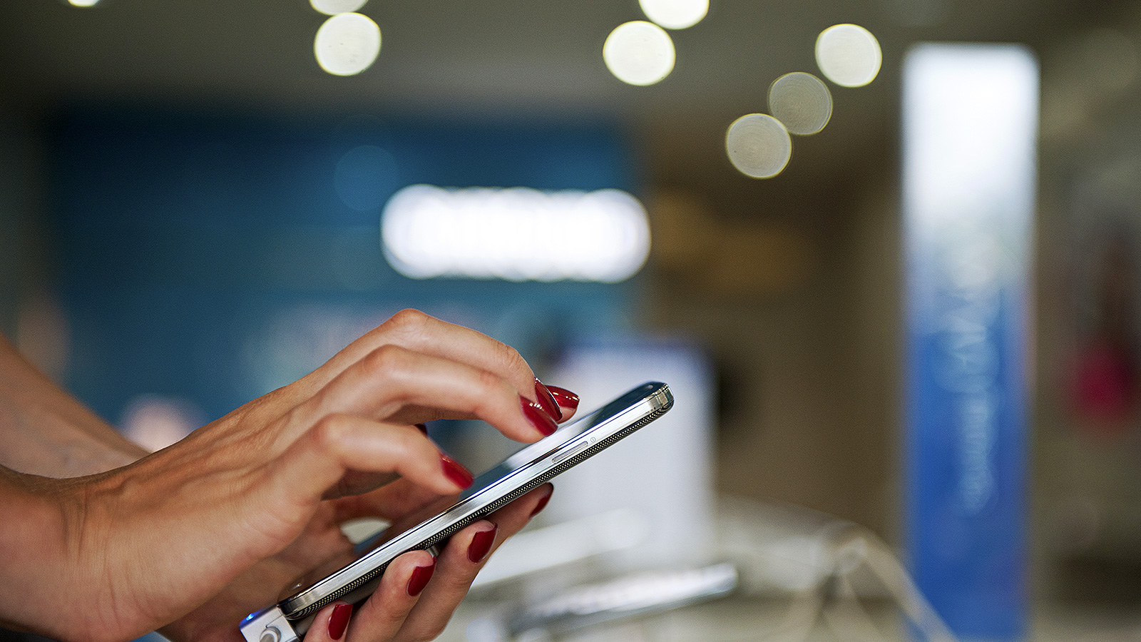 Woman using smart phone.